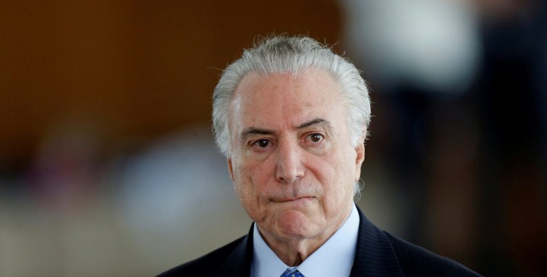 FILE PHOTO: Brazil's President Michel Temer reacts during breakfast with journalists at the Alvorada Palace in Brasilia