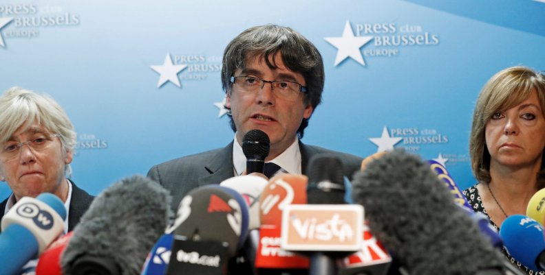 Sacked Catalan leader Carles Puigdemont and former members of the Government of Catalonia Clara Ponsati and Meritxell Borras attend a news conference in Brussels