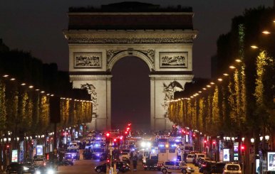 Police secure the Champs Elysees Avenue after one policeman was killed and another wounded in a shooting incident in Paris