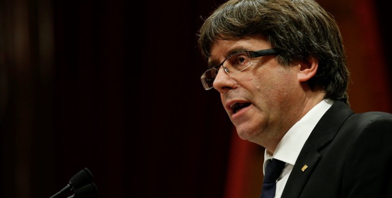 Catalan President Carles Puigdemont delivers a speech in the Catalan regional parliament in Barcelona