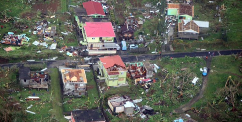 Damaged homes from Hurricane Maria are shown in this aerial photo over the island of Dominica