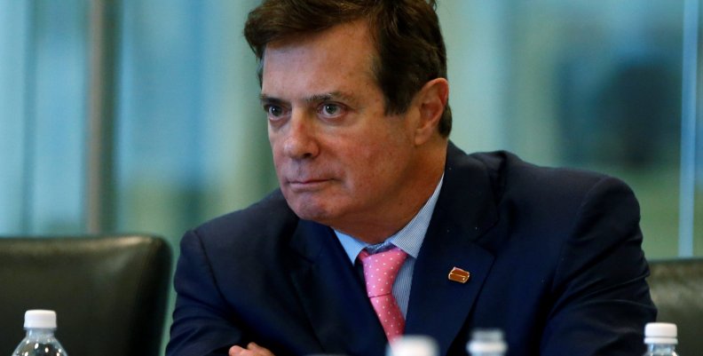 FILE PHOTO: Manafort of Republican presidential nominee Trump's staff listens during a round table discussion on security at Trump Tower in the Manhattan borough of New York FILE PHOTO: Manafort of Republican presidential nominee Trump's staff listens during a round table discussion on security at Trump Tower in the Manhattan borough of New York