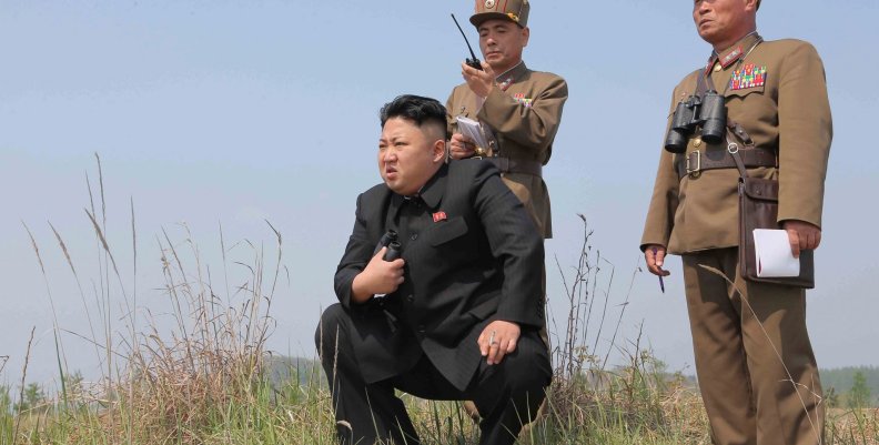 FILE PHOTO: North Korean leader Kim Jong Un guides the multiple-rocket launching drill of women's sub-units under KPA Unit 851 FILE PHOTO: North Korean leader Kim Jong Un guides the multiple-rocket launching drill of women's sub-units under KPA Unit 851