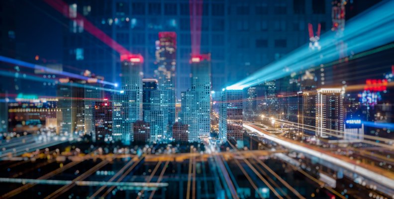 Light trails above buildings