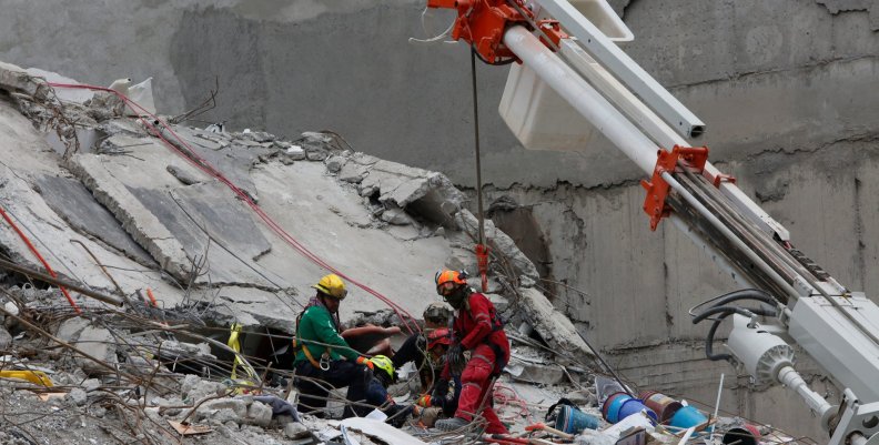 Members of Israeli and Mexican rescue teams search for survivors in the rubble of a collapsed building in Roma neighbourhood after an earthquake in Mexico City Members of Israeli and Mexican rescue teams search for survivors in the rubble of a collapsed building in Roma neighbourhood after an earthquake in Mexico City