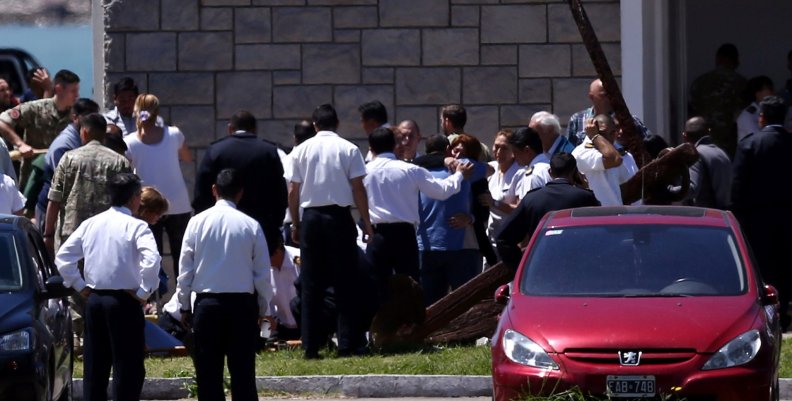 Members of the Navy and relatives of the 44 crew members of the missing at sea ARA San Juan submarine react at an Argentine naval base in Mar del Plata