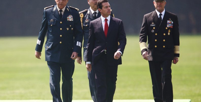 Mexico's President Enrique Pena Nieto participates with Mexico's Defense Minister General Salvador Cienfuegos and Mexico's Secretary of the Navy Admiral Vidal Francisco Soberon during Flag Day celebrations at Campo Marte in Mexico City Mexico's President Enrique Pena Nieto participates with Mexico's Defense Minister General Salvador Cienfuegos and Mexico's Secretary of the Navy Admiral Vidal Francisco Soberon during Flag Day celebrations at Campo Marte in Mexico City
