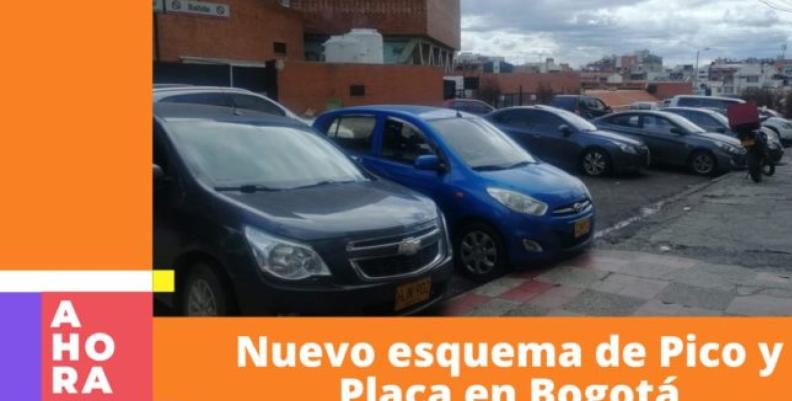 En la imagen se pueden ver varios carros en fila en un parqueadero de Bogotá durante el día. 