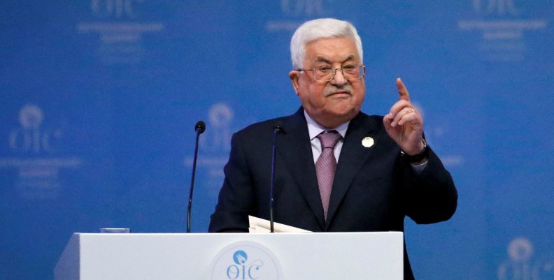 Palestinian President Mahmoud Abbas speaks during an extraordinary meeting of the OIC in Istanbul