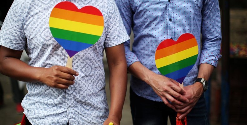 People attend the Gay Pride Parade in San Salvador