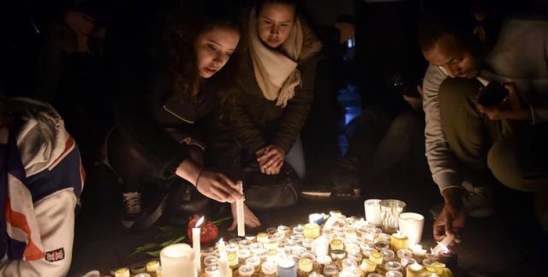 People light candles at a vigil in Trafalgar Square the day after an attack, in London People light candles at a vigil in Trafalgar Square the day after an attack, in London