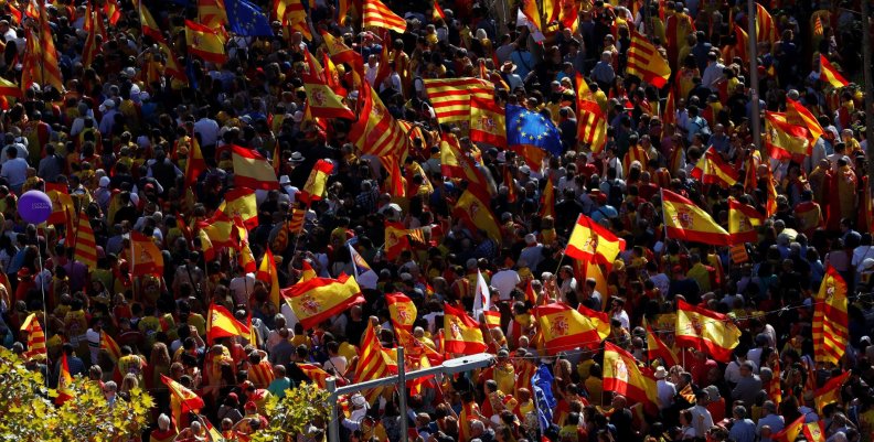 Pro-unity supporters take part in a demonstration in central Barcelona