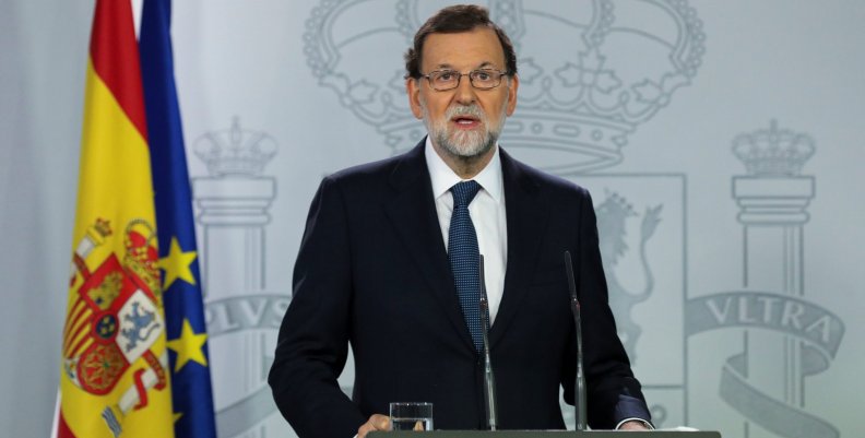 Spanish Prime Minister Mariano Rajoy delivers a statement at the Moncloa Palace in Madrid