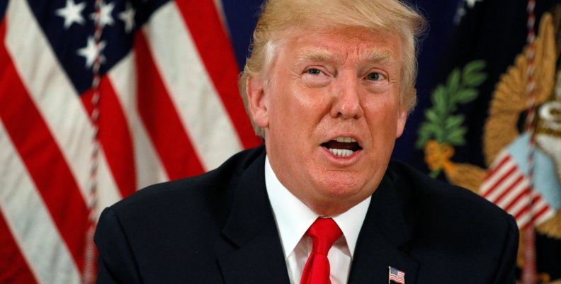 Trump speaks to reporters after a security briefing at his golf estate in Bedminster, New Jersey