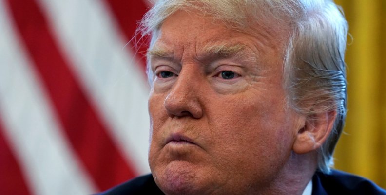 U.S. President Donald Trump pauses during an interview with Reuters in Washington