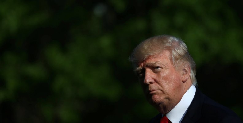 U.S. President Donald Trump walks from Marine One as he returns from a day trip to Atlanta on the South Lawn of the White House in Washington, U.S. U.S. President Donald Trump walks from Marine One as he returns from a day trip to Atlanta on the South Lawn of the White House in Washington, U.S.
