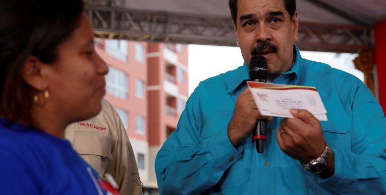 Venezuela's President Nicolas Maduro speaks during an event to hand over residences built under the government's housing programme, in Caracas, Venezuela