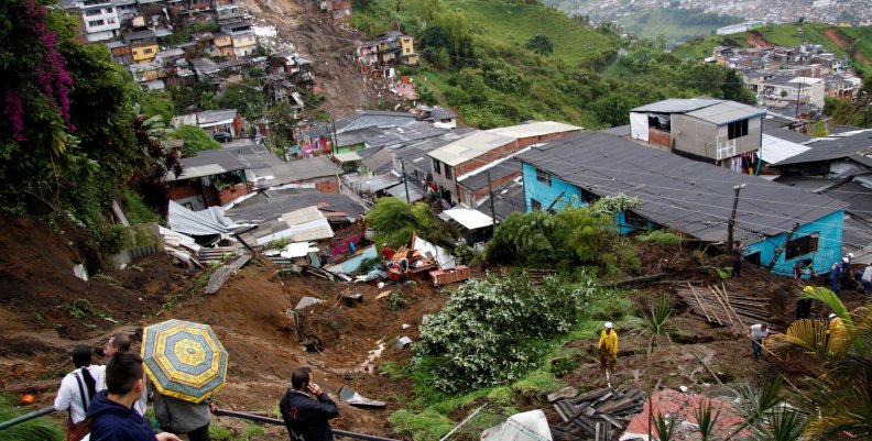 View of a neighborhood destroyed after mudslides, caused by heavy rains leading several rivers to overflow, pushing sediment and rocks into buildings and roads, in Manizales