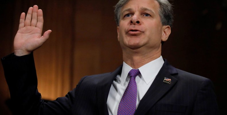 Wray is sworn in prior to testifying before Senate Judiciary Committee confirmation hearing on Capitol Hill in Washington