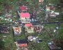 Damaged homes from Hurricane Maria are shown in this aerial photo over the island of Dominica