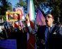 Opponents of Iranian President Hassan Rouhani hold a protest outside the Iranian embassy in Rome