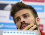 Spain's national soccer team player Gerard Pique gestures during a news conference at the training grounds in Las Rozas, outside Madrid