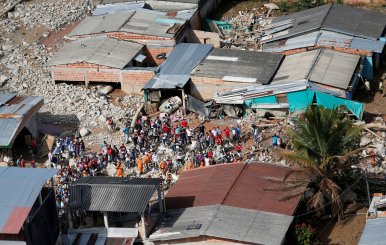 Aerial view of a neighborhood destroyed after flooding and mudslides caused by heavy rains leading several rivers to overflow, pushing sediment and rocks into buildings and roads, in Mocoa