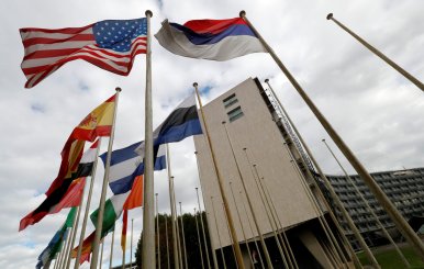 An American flag flies outside the headquarters of the United Nations Educational, Scientific and Cultural Organization (UNESCO) in Paris