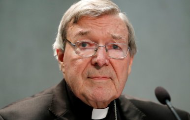 Cardinal George Pell attends news conference at the Vatican