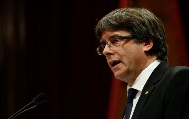 Catalan President Carles Puigdemont delivers a speech in the Catalan regional parliament in Barcelona