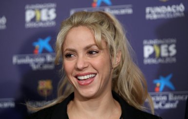 Colombian singer Shakira poses during a charity event with FC Barcelona at Camp Nou stadium in Barcelona