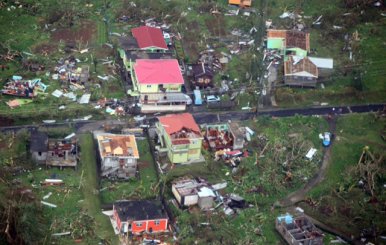 Damaged homes from Hurricane Maria are shown in this aerial photo over the island of Dominica