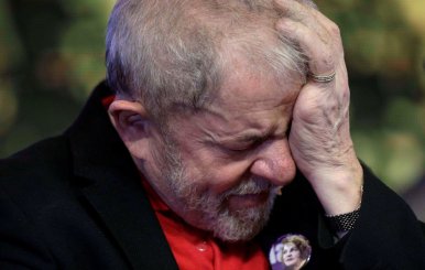 FILE PHOTO: Former Brazilian President Luiz Inacio Lula da Silva, gestures during opening ceremony of the national congress of the Workers' Party in Brasilia