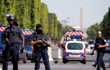 French policemen secure the area on the Champs Elysees avenue after an incident in Paris