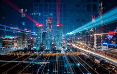 Light trails above buildings