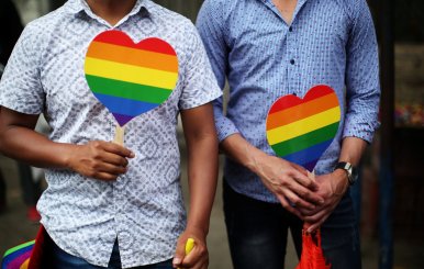 People attend the Gay Pride Parade in San Salvador