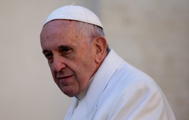 Pope Francis looks on as he arrives to lead the Wednesday general audience in Saint Peter's square at the Vatican