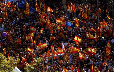 Pro-unity supporters take part in a demonstration in central Barcelona