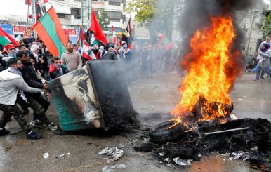 Protesters are seen near the U.S. embassy in Awkar, in Beirut