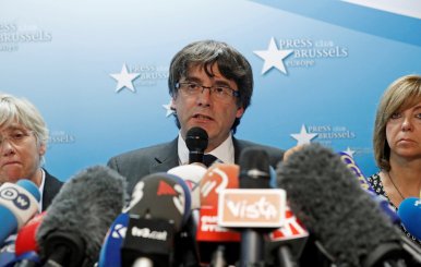 Sacked Catalan leader Carles Puigdemont and former members of the Government of Catalonia Clara Ponsati and Meritxell Borras attend a news conference in Brussels