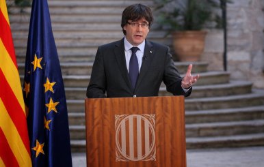 Sacked Catalan President Carles Puigdemont delivers an address in Girona