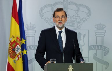 Spanish Prime Minister Mariano Rajoy delivers a statement at the Moncloa Palace in Madrid