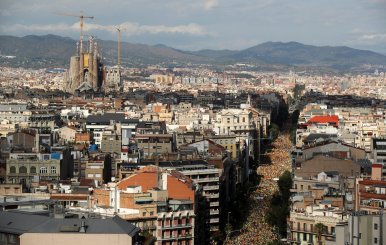 The Sagrada Familia cathedral is seen as thousands of people gather for a rally on Catalonia's national day 'La Diada' in Barcelona