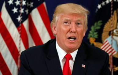 Trump speaks to reporters after a security briefing at his golf estate in Bedminster, New Jersey