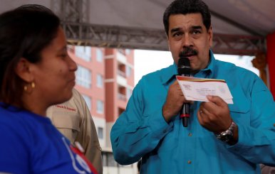 Venezuela's President Nicolas Maduro speaks during an event to hand over residences built under the government's housing programme, in Caracas, Venezuela